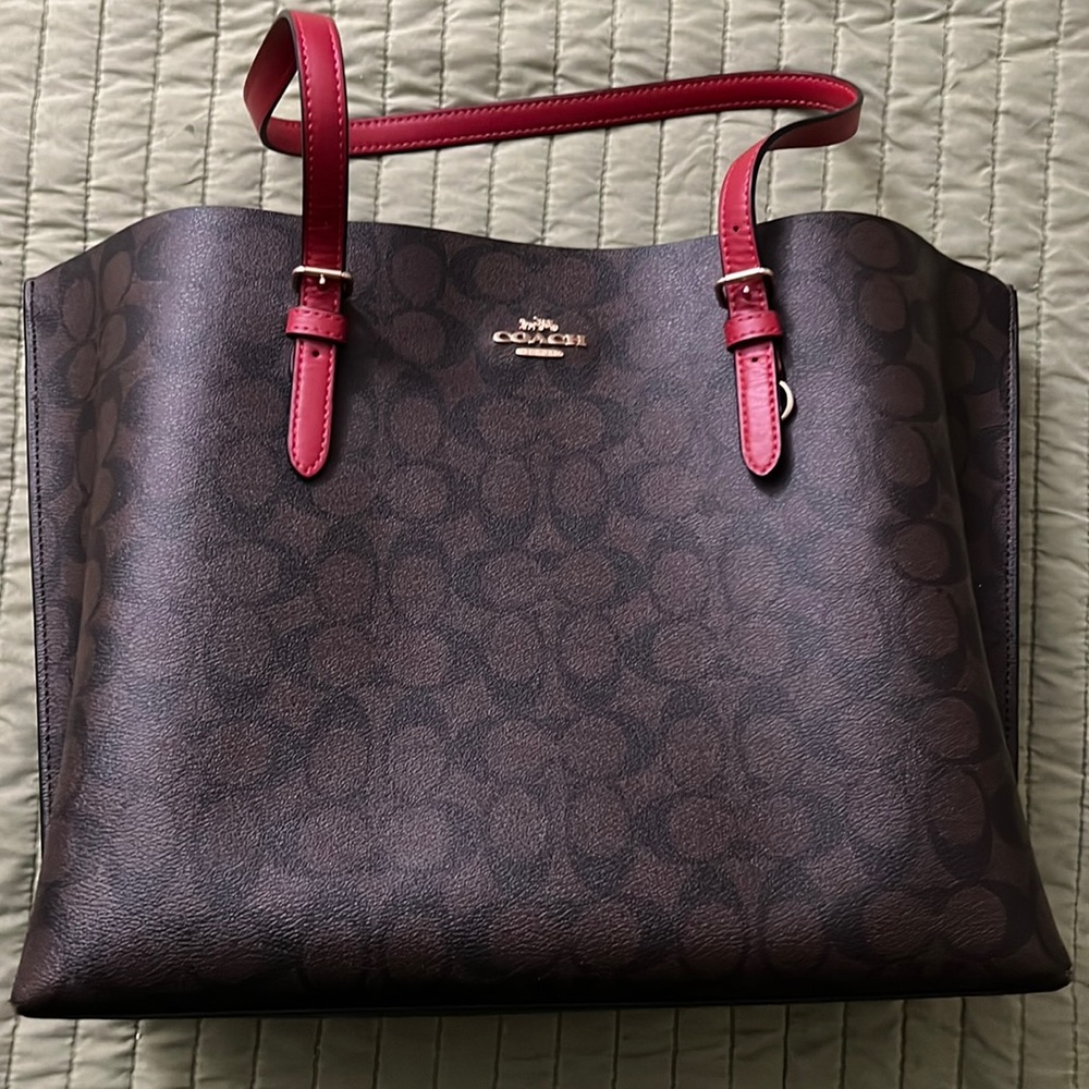 Coach tote bag with red handles ! Ready to move onto something else !